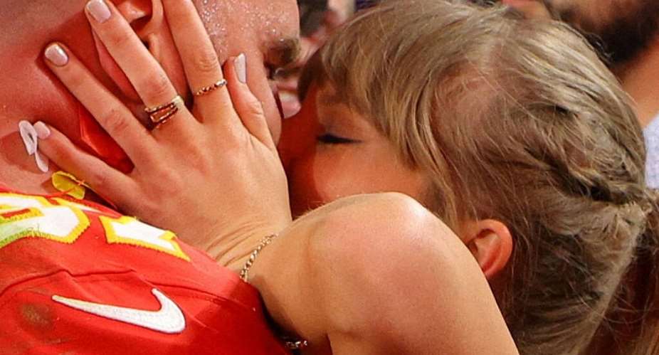 Kansas City Chiefs Travis Kelce kisses partner Taylor Swift as they celebrate after the Kansas City Chiefs win Super Bowl LVIII. -  Brian Snyder, Reuters