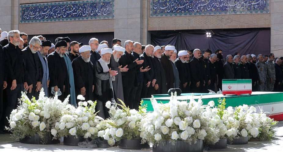 Iranian President Masoud Pezeshkian and Irans Parliament speaker Mohammad Baqer Qalibaf with officials attend a prayer during a public farewell ceremony to pay their respects to late Supreme Leader Ayatollah Ali Khamenei at the Imam Khomeini Grand Mosalla, in Tehran, Iran July 5, 2026. -  Reuters