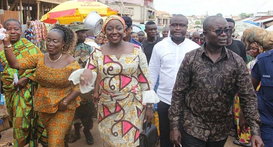 Lady Julia and Osei Assibey being welcomed to the Bantama market