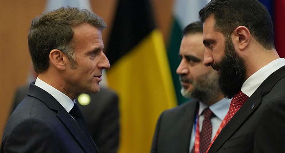 French President Emmanuel Macron talks with Syrian interim President Ahmad al-Sharaa during the EU Summit in Nicosia, Cyprus on April 24, 2026. -  Petros Karadjias, AP