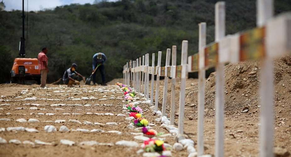 Workers prepare graves on the day of the burial of earthquake victims, in the aftermath of the June 24 earthquakes, at La Esperanza Cemetery, in La Guaira, Venezuela, July 6, 2026. -  Adriano Machado, Reuters