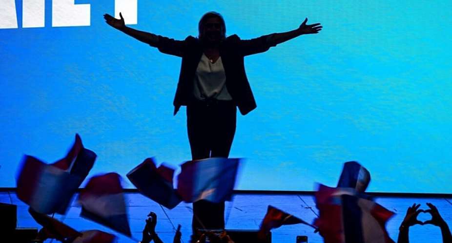 The leader of Frances National Rally party Marine Le Pen gestures as she arrives to deliver a speech in Maon on May 1, 2026. -  Olivier Chassignole, AFP