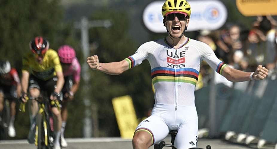 Slovenian rider Tadej Pogacar cycles to the finish line to win the 3rd stage ahead of Danish rider Jonas Vingegaard (L) during the 113th edition of the Tour de France cycling race, 196 km between Granollers and Les Angles in southern France, on July 6, 2026. -  Loc Venance, AFP