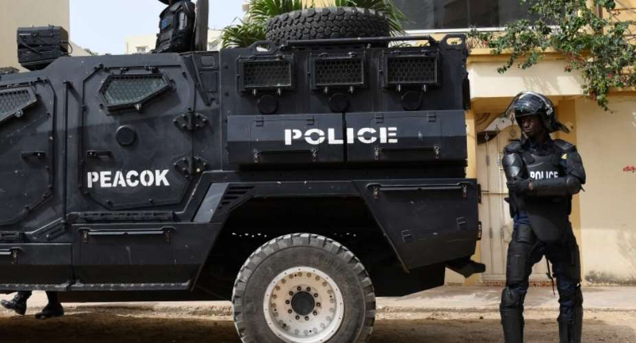 Senegalese policemen in Dakar on June 17, 2022. During a June 21 Facebook video, Talla Sylla, a member of the ruling APR party's youth branch, called for attacks on the privately owned Walfadjri media company and its journalists. SeyllouAFP