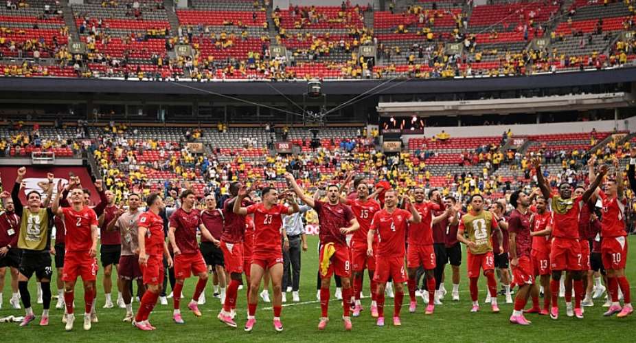Switzerland players celebrated with their fans at the Vancouver Stadium after seeing off Colombia in a penalty shootout. - Getty Images via AFP - DAVID RAMOS