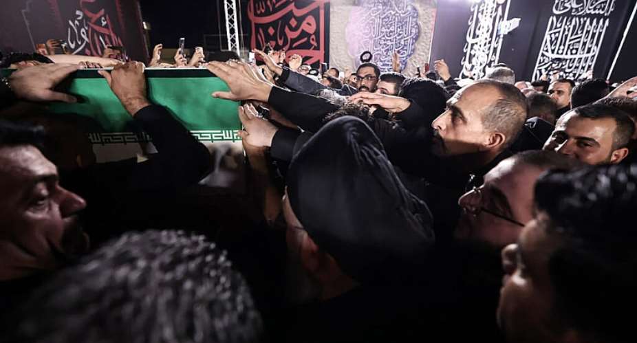 Iraqi officials and senior politicians received the remains of Khamenei on Tuesday night at Najaf international airport. -  Media office of senior politician and cleric Ammar al-Hakim via AFP