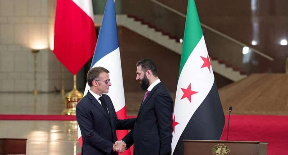Frances President Emmanuel Macron and Syrian President Ahmed Al-Sharaa shake hands on the day they meet in Damascus, Syria,  on 7 July, 2026. - REUTERS - Mahmoud Hassano