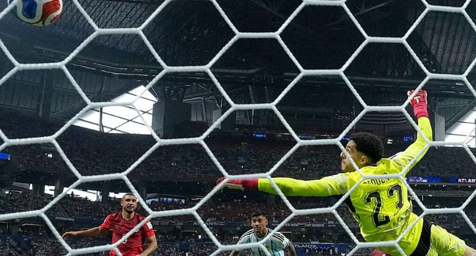 Argentinas Cristian Romero (13) scores their opening goal during the World Cup round of 16 soccer match between Argentina and Egypt in Atlanta, Georgia on July 7, 2026. -  Mike Stewart, AP Photo