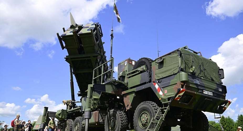 Visitors queue to take a closer look at a Patriot missile launcher during the Armed Forces Day at the Airbase in Laage, Germany, on June 06, 2026. -  John MacDougall, AFP