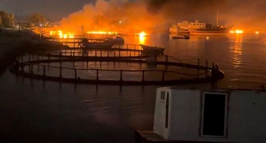 Smoke rises from a port near the Strait of Hormuz, following a U.S. strike in Kuhestak, Iran, on July 8, 2026. -  Social Media via Reuters