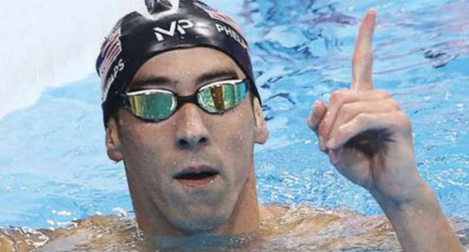 Phelps claims 21st Olympic gold