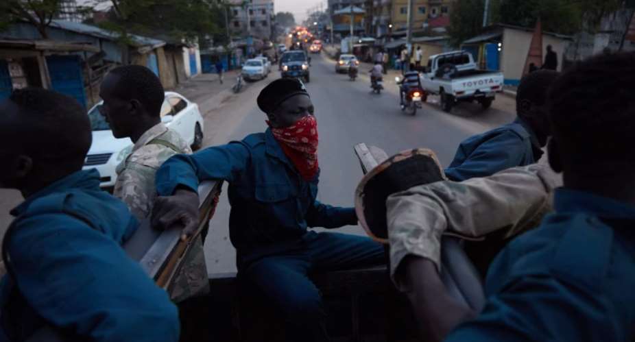 South Sudanese police are seen in Juba on April 9, 2020. Police recently arrested journalist Diing Magot in Juba. AFPAlex McBride