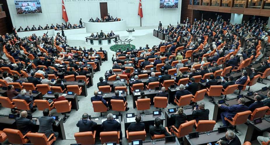 Lawmakers take part in a voting session on a bill offering limited amnesty for Kurdish PKK militants at the Grand National Assembly of Turkey in Ankara on August 10, 2026. -  Adem Altan, AFP