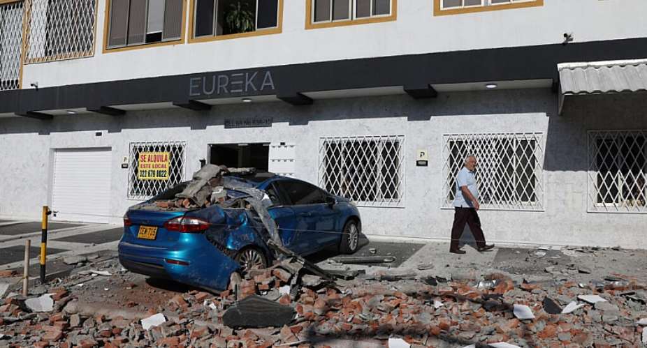 Debris covers a car after an earthquake struck Cali, Colombia, Monday, Aug. 10, 2026. -  Santiago Saldarriaga, AP