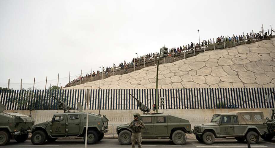 Spain rushed troops, more police, drones, divers and boats to Ceuta -  JORGE GUERRERO / AFP