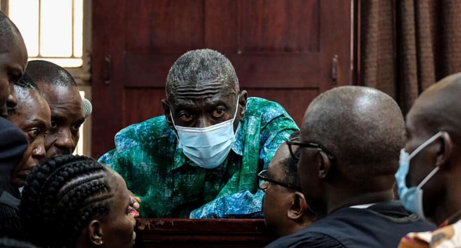 Ugandas veteran opposition leader Kizza Besigye, and his aides seen at High Court, in Kampala, Uganda, on 29 December, 2025. - AP - Hajarah Nalwadda