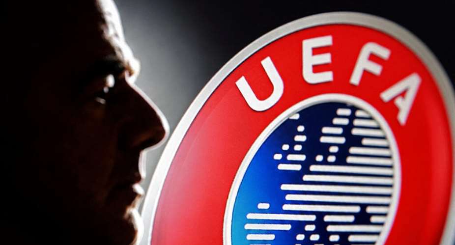 A silhouette depicting FIFA President Gianni Infantino is seen next to a UEFA logo in this illustration taken July 30, 2026. -  Dado Ruvic, Reuters