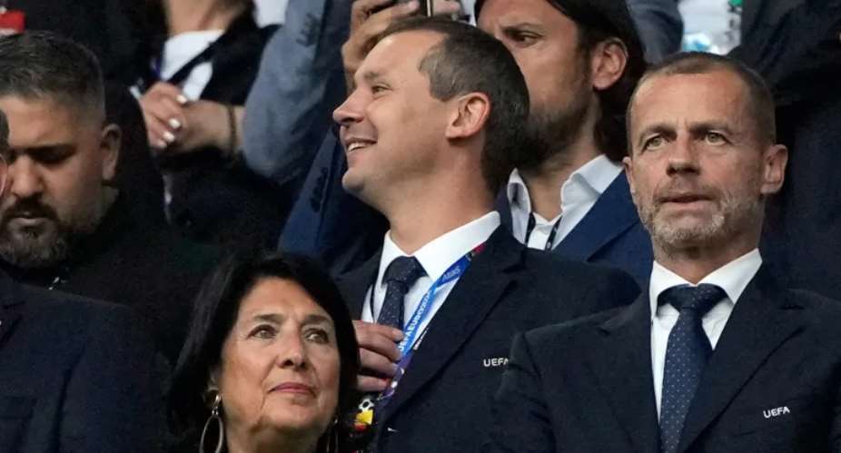 FIFA COO Kevin Lamour, centre, is the latest to speak out against World Cup private investment plans Alessandra Tarantino/AP