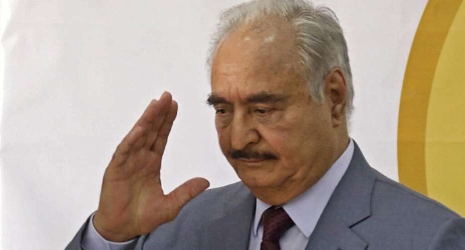 Libyas eastern military chief Khalifa Haftar waves after a speech at the local headquarters of the High National Election Commission in Benghazi on November 16, 2021. -  Abdullah Doma, AFP