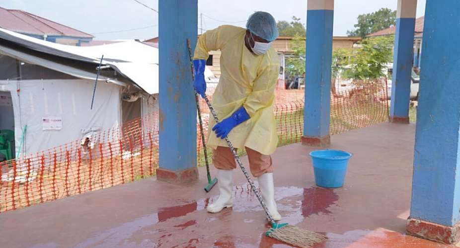 A health worker mops the floor of the Ebola treatment centre in Bunia General Hospital Ituri, eastern DR Congo, Tuesday, 11 August, 2026. - AP Photo/Dieudonne Dirole - Dieudonne Dirole