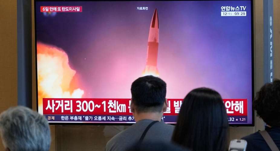 A TV screen shows a file image of North Koreas missile launch during a news program at Seoul Railway Station on August 12, 2026. -  Ahn Young-joon, AP