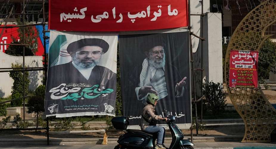 Banners reading in English and Farsi We will kill Trump” and portraits of the late Iranian Supreme Leader Ayatollah Ali Khamenei, right, and his son and successor Ayatollah Mojtaba Khamenei, in Tehran, 10 August 2026. - AP Photo/Vahid Salemi - Vahid Salemi