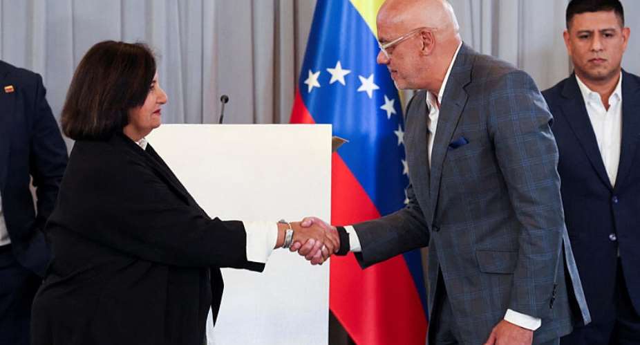 Venezuelas National Assembly President Jorge Rodriguez and former opposition lawmaker Dinorah Figuera shake hands during the closing day of the first cycle of national dialogue talks, in Caracas, Venezuela, on August 12, 2026. -  Leonardo Fernandez Viloria, Reuters