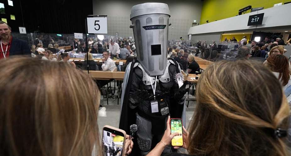 Count Binface poses for photographers during the election count in Wigan, England, 19 June. -  Jon Super / AP Photo