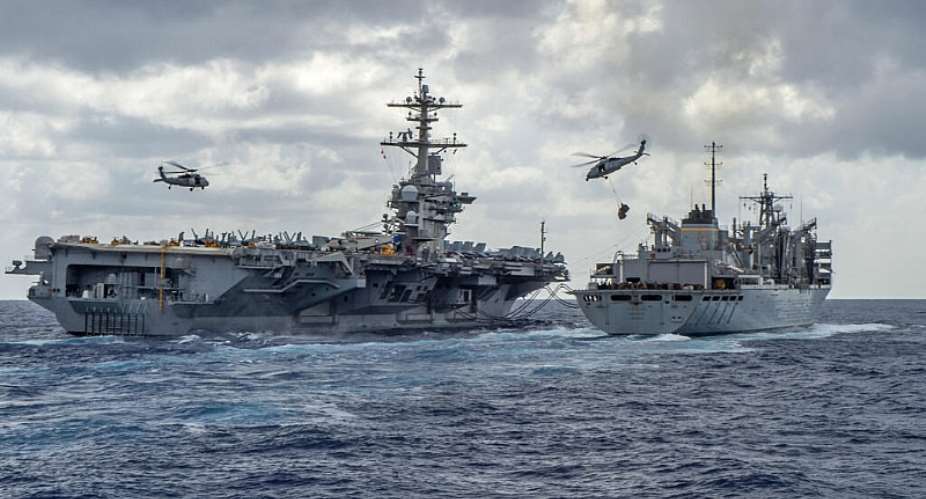 This handout picture released by the US Navy on May 8, 2019 shows the Nimitz-class aircraft carrier USS Abraham Lincoln (CVN 72) while conducting a replenishment-at-sea. -  Jason Waite, US Navy via AFP file photo
