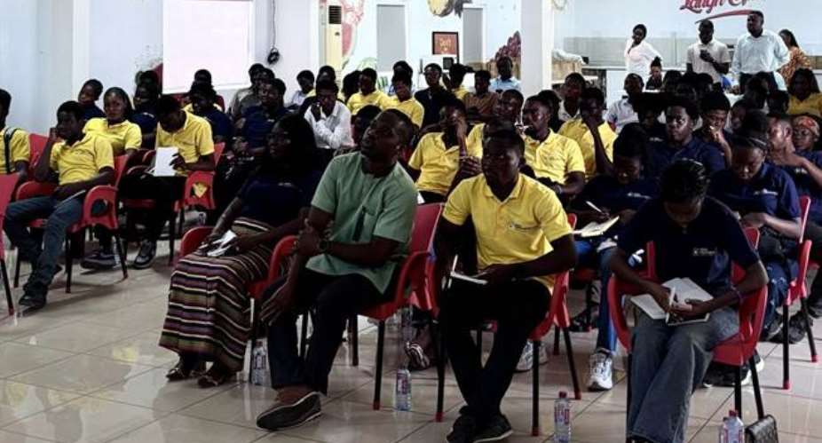 Dr. Augustina Dede Agor and Kojo Fraiku Clement with a cross-section of participating UPSA Developers Hub members during the educational engagement at AT Ghana.