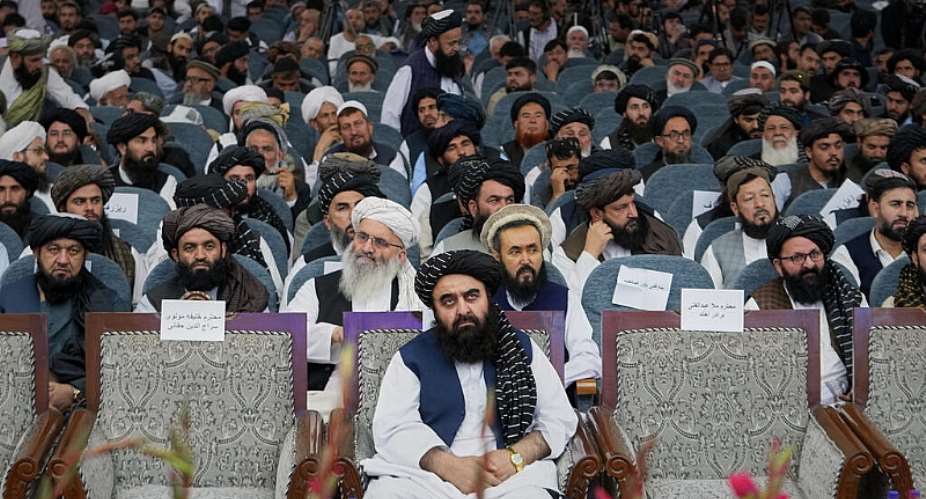 Afghan Foreign Minister Amir Khan Muttaqi, centre, sits as Taliban delegates from across the country gather for celebrations marking the fifth anniversary of the US withdrawal and the Talibans return to power. -  Siddiqullah Alizai, AP