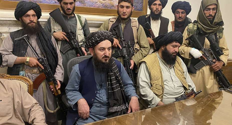 Taliban fighters take control of Afghan presidential palace after the Afghan President Ashraf Ghani fled the country, in Kabul, Afghanistan, Aug. 15, 2021. APZabi Karimi