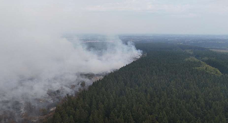 This aerial photograph shows a wildfire burning in the Hautes Fagnes (High Fens) nature reserve in Waimes on August 15, 2026. -  Dimitri Korczak, AFP