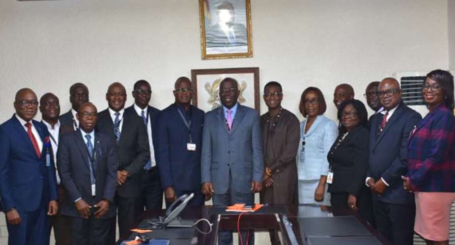 SSNIT DG, Dr. John Ofori Tenkorang middle and executives, with visiting Liberian Social Security delegation. Flanking him on the left, Nya Twayen