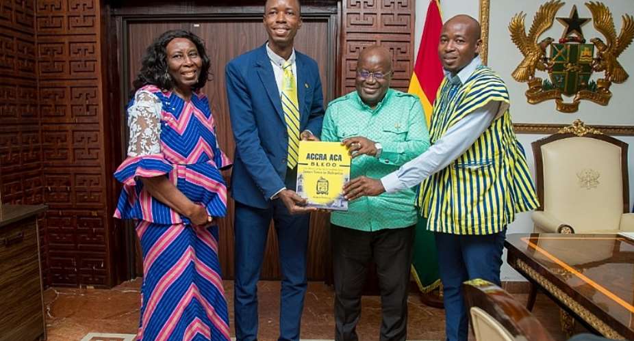 Mr. Simon Ontoyin, the author in suit, making the presentation to H.E. President Nana Addo Dankwa Akufo-Addo. Also pictured are Mrs. Esther Sandra Ontoyin and Mr. Jude Ontoyin, the mother and twin brother of the author