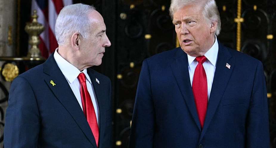 (FILES) US President Donald Trump (R) greets Israeli Prime Minister Benjamin Netanyahu (L) upon arrival at Trumps Mar-a-Lago residence in Palm Beach, Florida, on December 29, 2025. -  Jim Watson, AFP