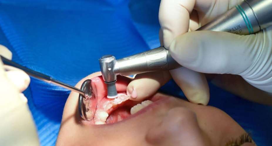 A child in a dentists chair