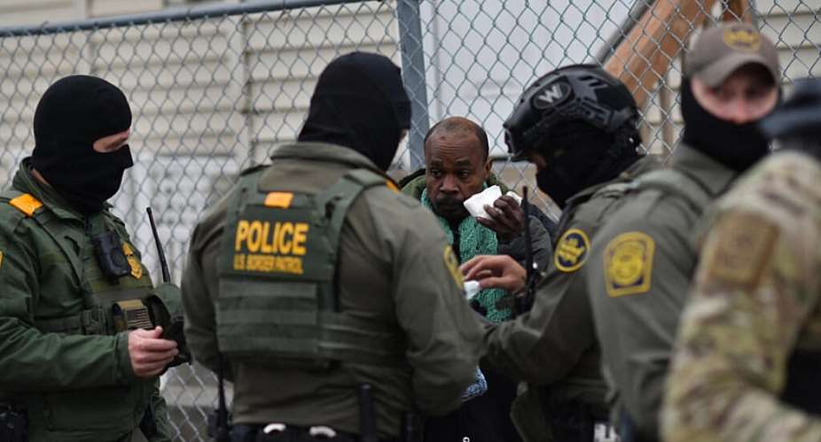 US Border Patrol agents detain an unidentified man of Somali descent in Minneapolis, Minnesota, on 8 January, 2026. - AFP - OCTAVIO JONES