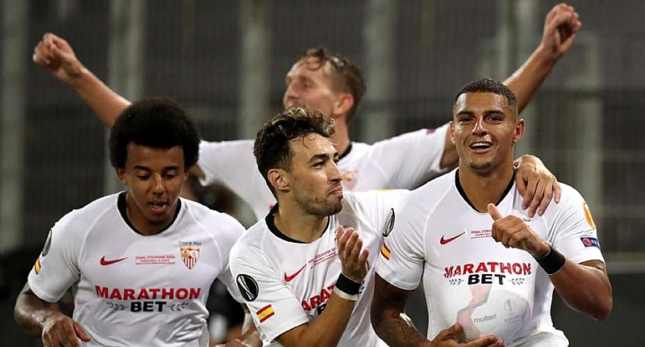 Diego Carlos of Sevilla FC R and team mates celebrate their team's third goal, an own goal scored by Romelu Lukaku of Inter Milan not pictured during the UEFA Europa League Final between Seville and FC Internazionale at RheinEnergieStadion on August 2Image credit: Getty Images