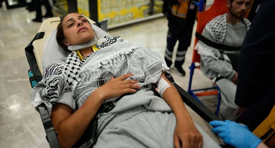 An activist from the Global Sumud Flotilla is carried on a wheel stretcher upon her arrival at Istanbul Airport on Thursday, May 21, 2026. -  Emrah Gurel, AP