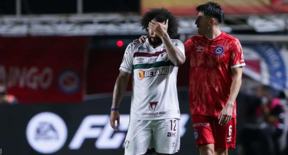 Marcelo was consoled by team-mates of Sanchez as he left the pitch