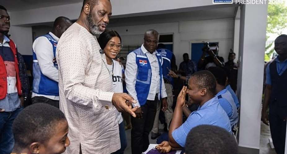 NPP Running Mate, Dr. Matthew Opoku-Prempeh engaging registrants at a voter registration centre