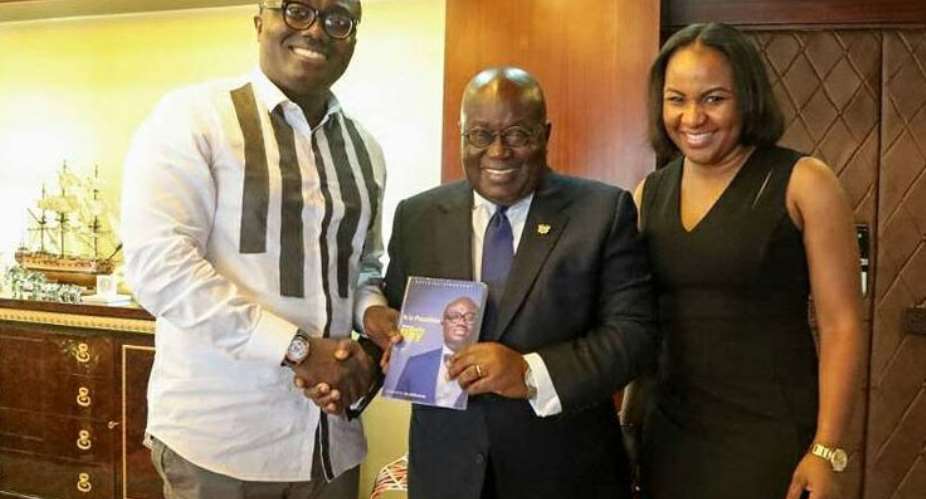 President Nana Addo middle in a pose with Bola Ray and his wife