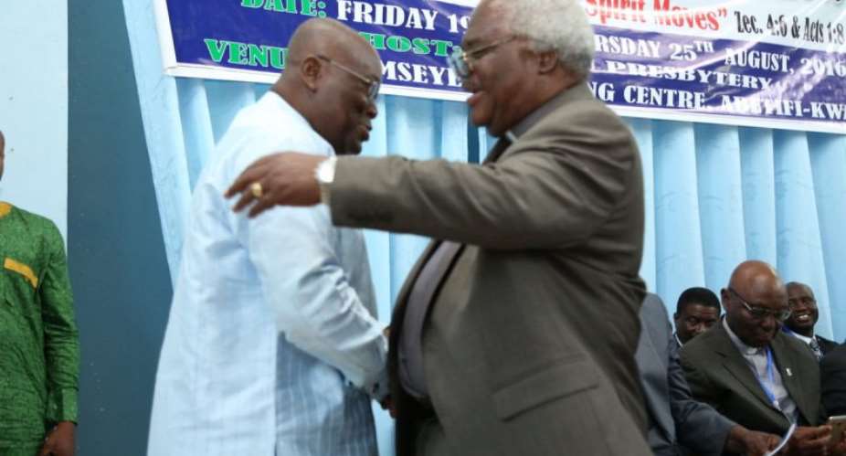 Nana Akufo-Addo left in a handshake with Professor Martey