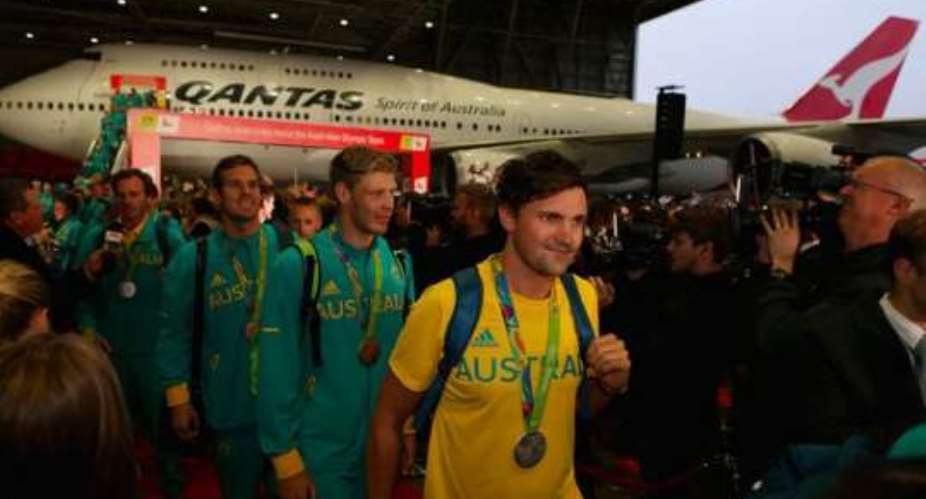 Australian Olympians fly home, warned about safe sex over Zika fears