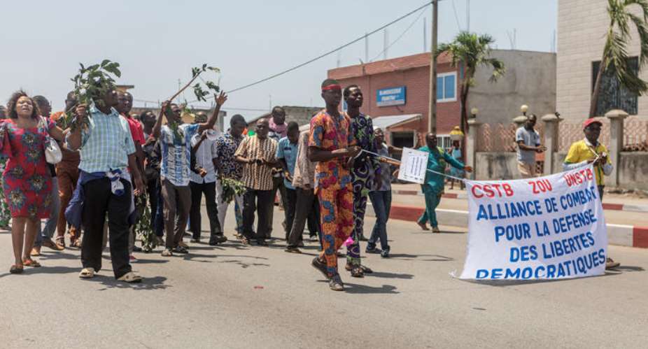 Protesters From Two Of Benin's Unions Take Part In A Demonstration After The Parliament Approved A Law Restricting To 10 Days Public Sector Employees Right To Strike, On September 13, 2018, In Cotonou. Journalist Ignace Sossou Convicted Of False News In Benin On August 12, 2019. AFPYanick Folly
