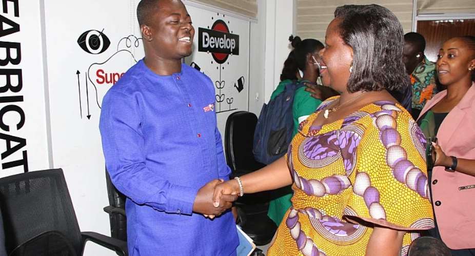 CEO of YEA, Mr Kofi Baah Agyepong, in a hearty handshake with Mrs. Perpetual Ofori Ampofo, President of GRNMA