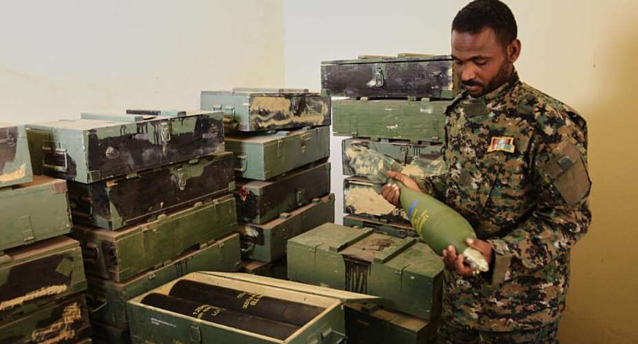 Sudanese army officers inspect a recently discovered weapons storage site belonging to the paramilitary Rapid Support Forces in Khartoum, 3 May, 2025. -  AP