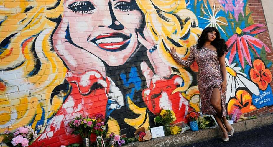 Dolly Parton’s music found devoted audiences across Africa, from Kenya to South Africa, where she collaborated with renowned Zulu vocal group Ladysmith Black Mambazo in the 1990s. - AP Photo/George Walker IV - George Walker IV