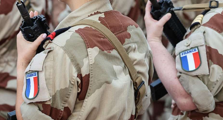 Frances Ministry of the Armed Forces has launched disciplinary proceedings against several soldiers photographed displaying Rhodesian flags, which have become associated with white supremacist movements. - AFP - LUDOVIC MARIN